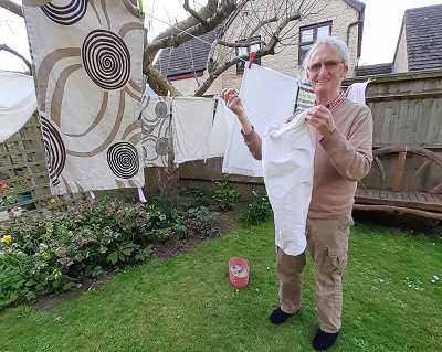 David with his finished laundry bags