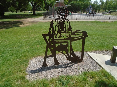 Statue of lady at a desk